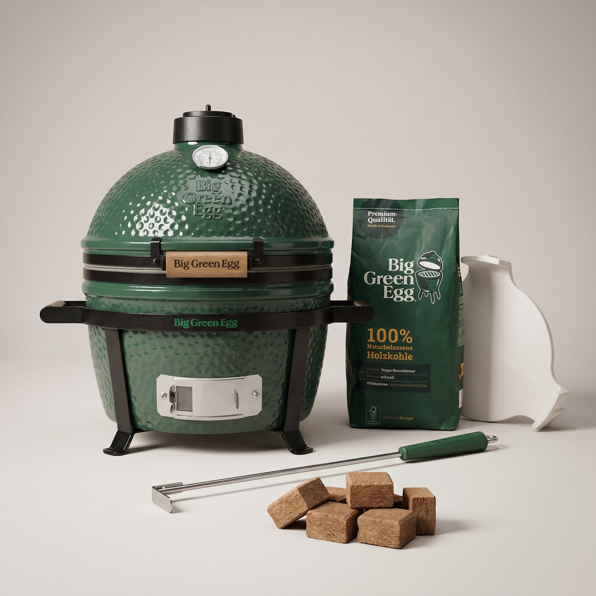 Big Green Egg Minimax Starterpaket — Kamadogrill mit Carrier, Conveggtor, 4,5 kg Holzkohle, Anzünder und Ascheschieber